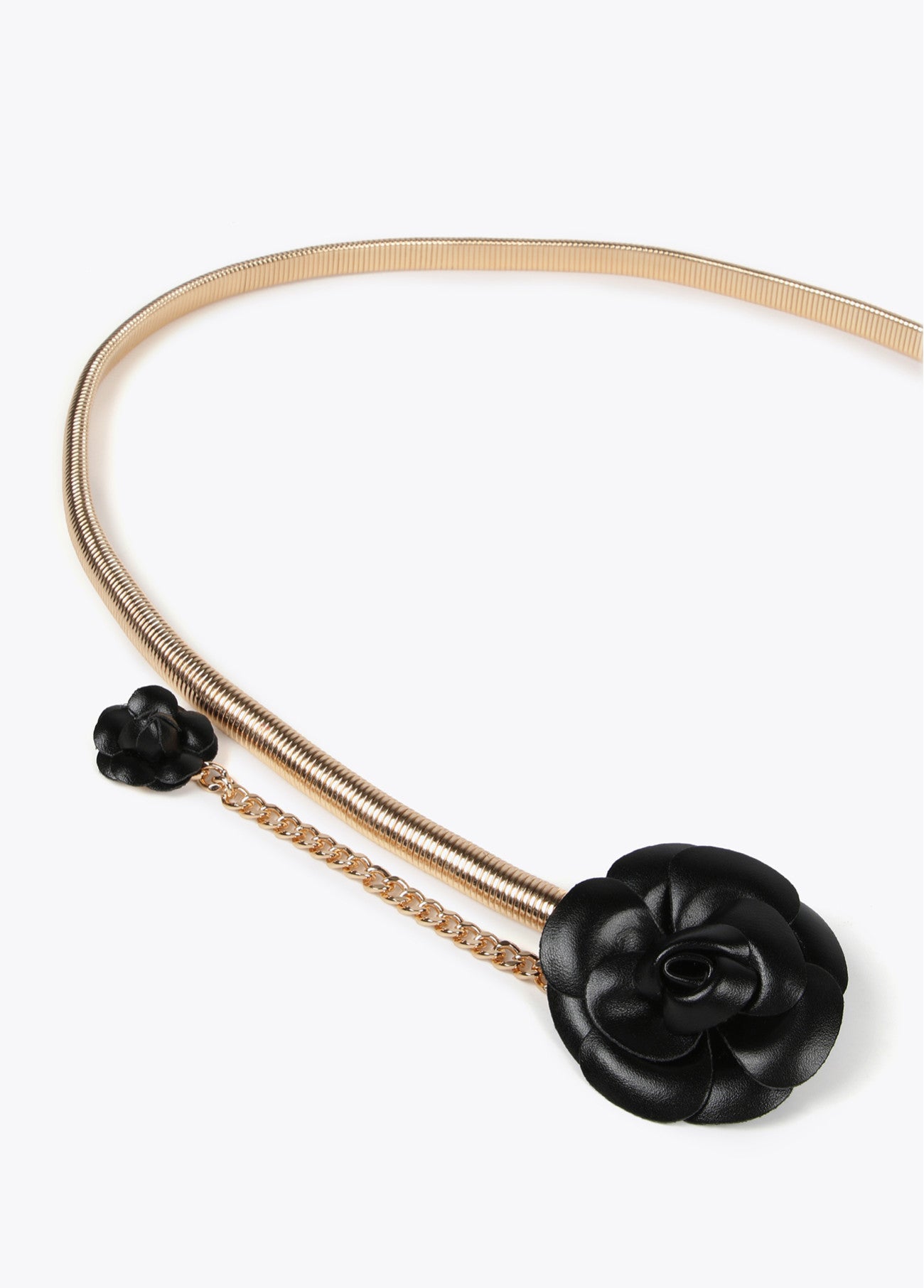 CINTURÓN METAL ELÁSTICO FLORES EFECTO PIEL NEGRO