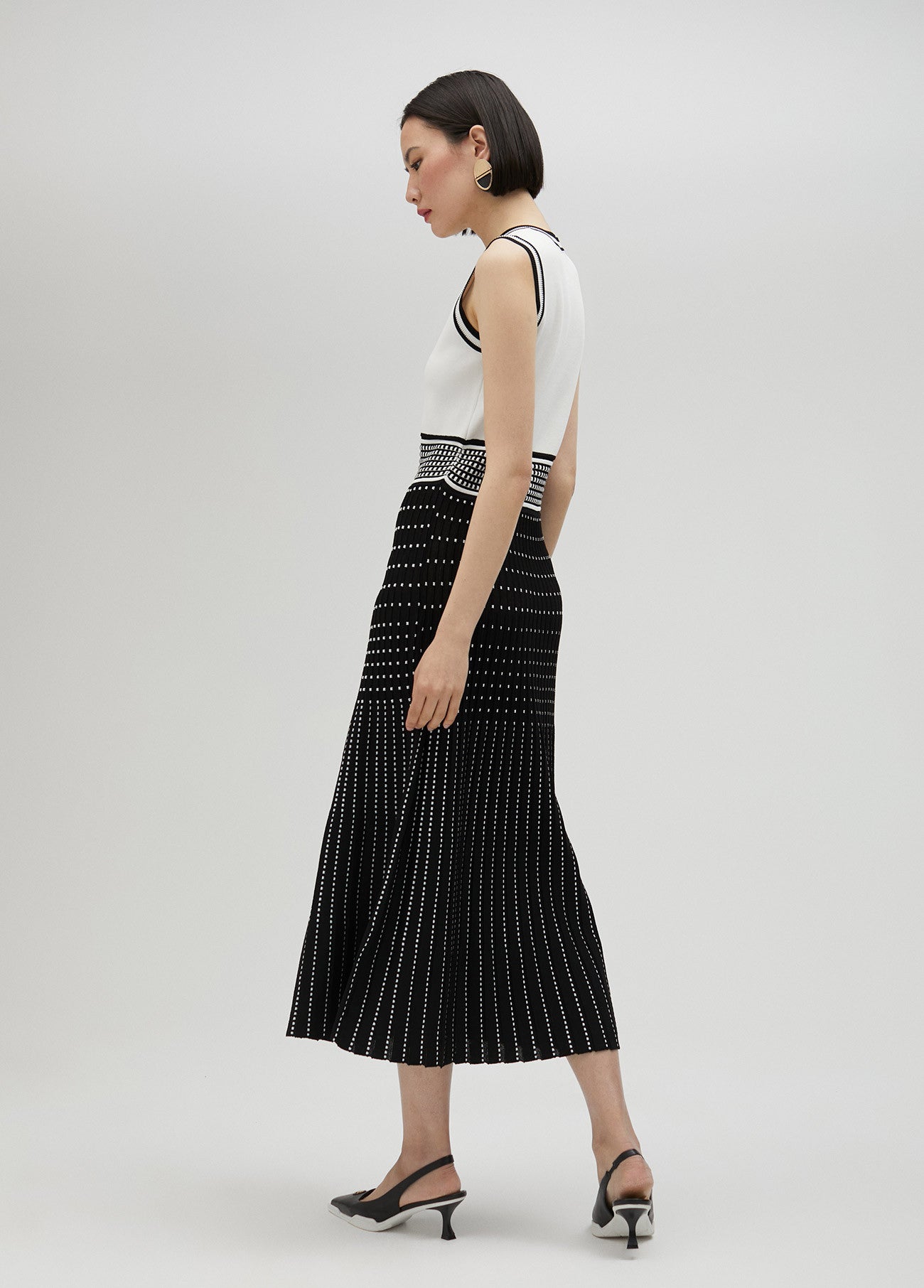 VESTIDO DE PUNTO EFECTO PLISADO